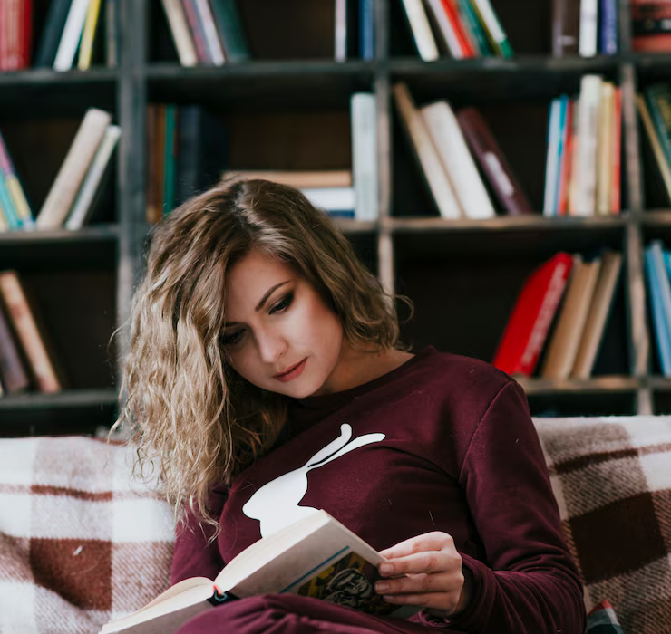 young-woman-enjoying-reading